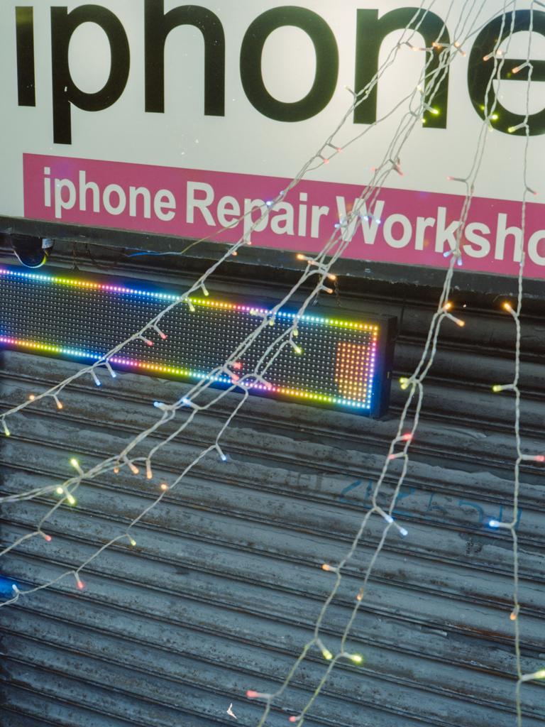 Around The Chaos · 17 Phone Repair · Printed on Archive Photography Paper